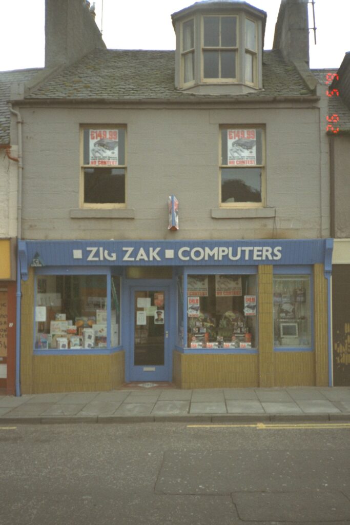 Exterior of a shop with flat above