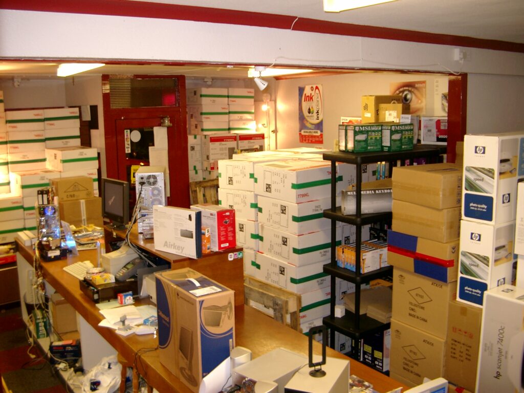 A computer shop completed filled with computers in boxes